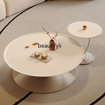 Stolić u svijetlo кремовом stilu za dnevni boravak, Минималистичная kombinacija okruglog tea stola na temelju nehrđajućeg čelika